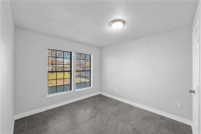 4617 Anlo St, Waco, TX 76710 - spare room featuring water heater, a ceiling fan, and light tile patterned floors