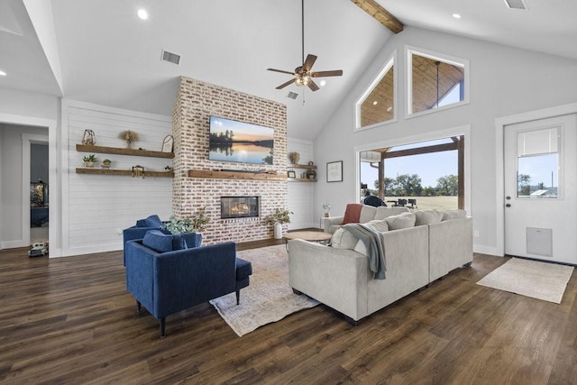1215 Ropers Alley Rd, Belton, TX 76513 - living room with visible vents, dark wood-type flooring, high vaulted ceiling, a fireplace, and ceiling fan