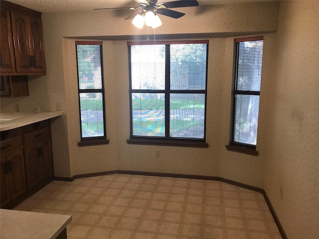 104 Virginia Dr, Hewitt, TX 76643 - unfurnished dining area featuring ceiling fan and light floors