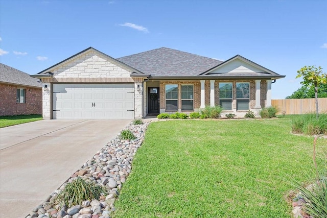 single story home featuring brick siding, fence, a front lawn, concrete driveway, and an attached garage