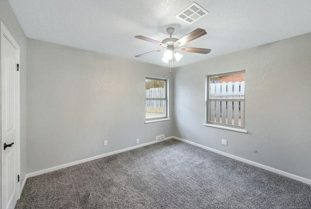 433 Sharron Dr, Woodway, TX 76712 - carpeted empty room featuring baseboards, visible vents, and ceiling fan
