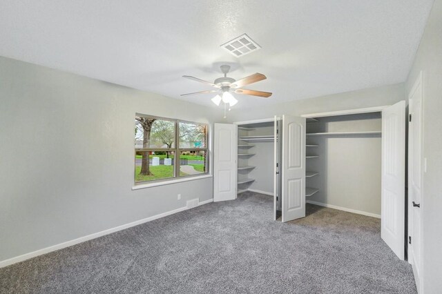 433 Sharron Dr, Woodway, TX 76712 - unfurnished bedroom with visible vents, baseboards, multiple closets, and carpet floors