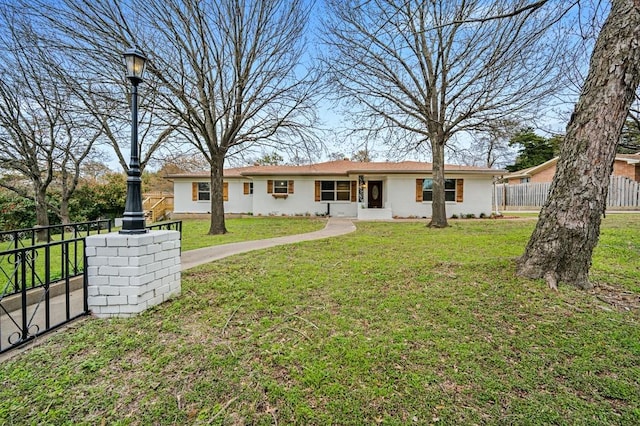 433 Sharron Dr, Woodway, TX 76712 - rear view of property with a lawn and fence