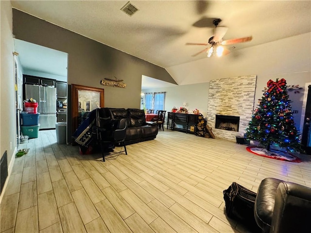 5703 Mandalay Dr, Killeen, TX 76549 - living area featuring vaulted ceiling, wood finished floors, visible vents, and ceiling fan