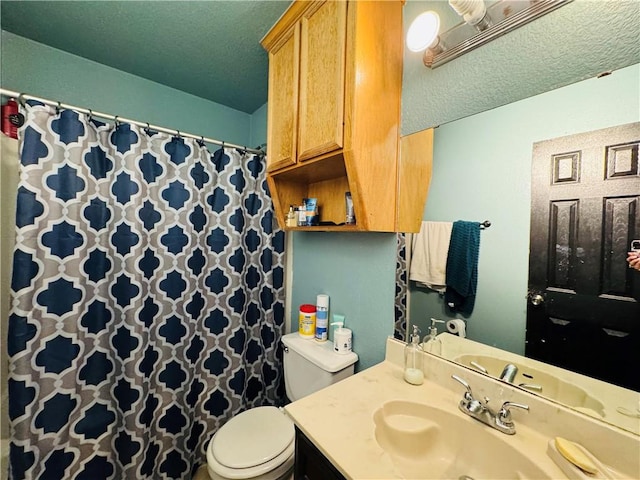 5703 Mandalay Dr, Killeen, TX 76549 - bathroom featuring a shower with shower curtain, toilet, and vanity