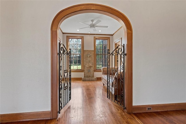3100 Austin Ave, Waco, TX 76710 - foyer featuring recessed lighting, hardwood / wood-style floors, arched walkways, baseboards, and ceiling fan