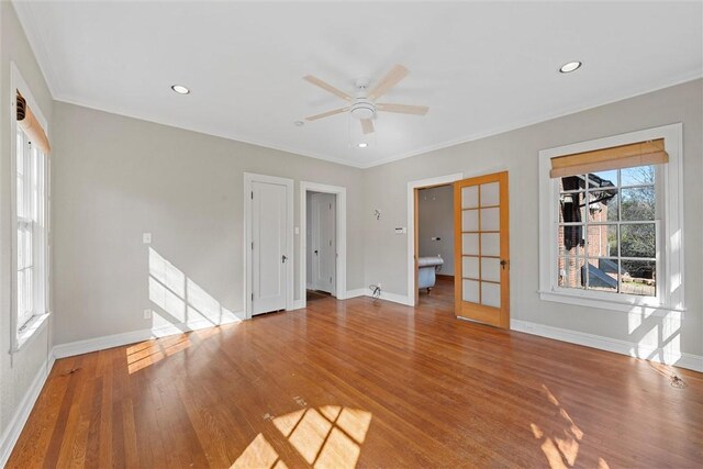 3100 Austin Ave, Waco, TX 76710 - unfurnished living room with wood finished floors, ornamental molding, baseboards, and ceiling fan