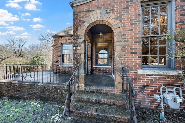 3100 Austin Ave, Waco, TX 76710 - entrance to property featuring fence, brick siding, and roof with shingles