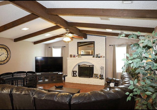 332 Crescent Dr, Hewitt, TX 76643 - living room featuring a ceiling fan and a brick fireplace