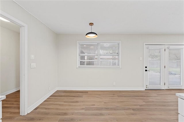 4209 Chestnut Rd, Temple, TX 76502 - unfurnished dining area featuring baseboards and light wood-style floors