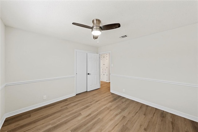 4209 Chestnut Rd, Temple, TX 76502 - unfurnished room with ceiling fan, visible vents, baseboards, and wood finished floors