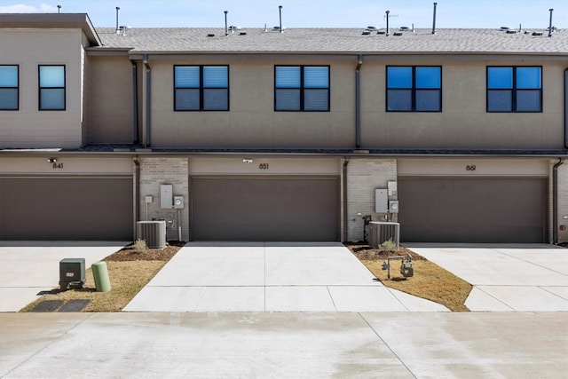 851 Cavitt Ct, Prosper, TX 75078 - view of front facade featuring a garage, driveway, and central air condition unit