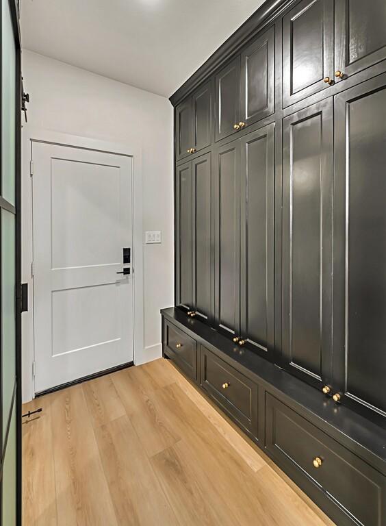 707 S 9th St, Waco, TX 76706 - mudroom featuring light wood-style floors