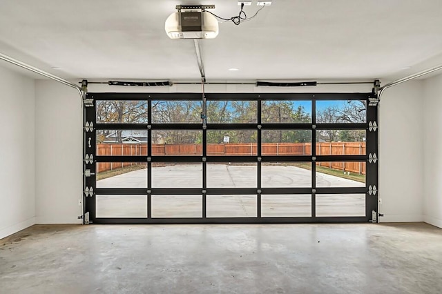 707 S 9th St, Waco, TX 76706 - garage with baseboards and a garage door opener
