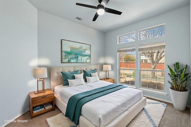 8664 Glenburne Dr, Fort Worth, TX 76131 - carpeted bedroom with baseboards, a ceiling fan, and visible vents