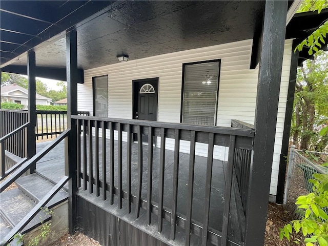 doorway to property with covered porch