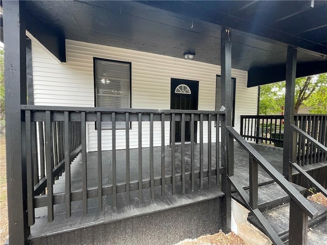 entrance to property with a porch