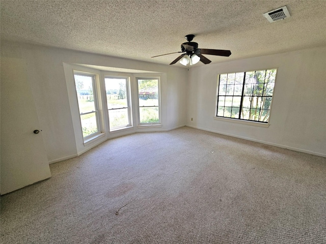338 Lcr 866, Donie, TX 75838 - carpeted empty room with ceiling fan, a textured ceiling, and baseboards