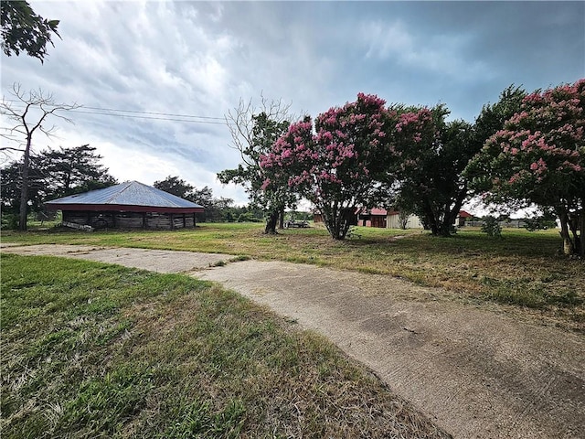 338 Lcr 866, Donie, TX 75838 - view of green lawn with an outbuilding