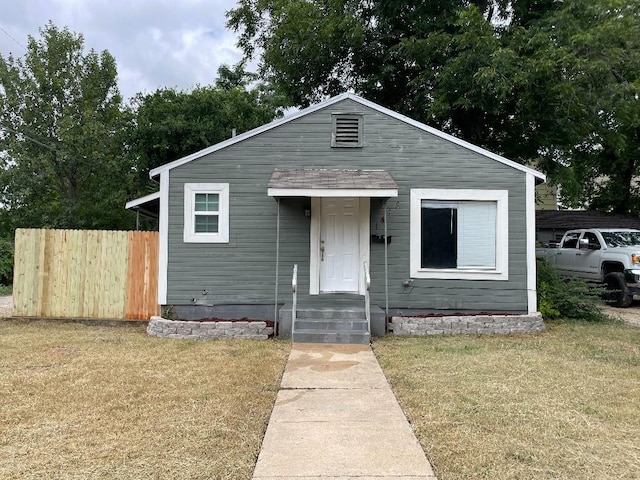 2400 Ethel Ave, Waco, TX 76707 - bungalow-style home with a front yard and fence
