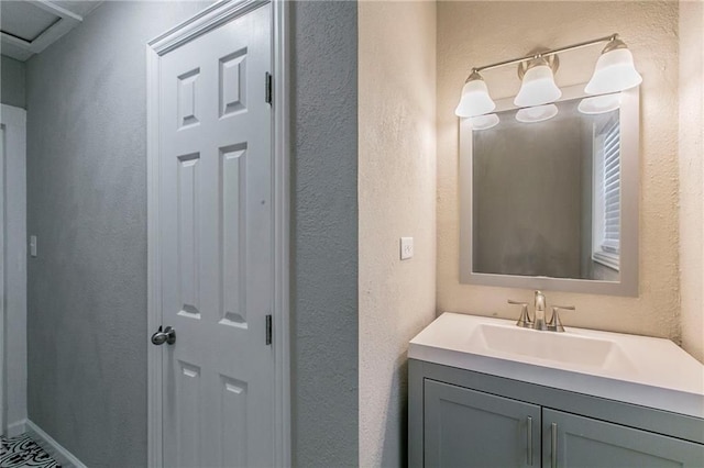 2400 Ethel Ave, Waco, TX 76707 - bathroom with vanity and a textured wall