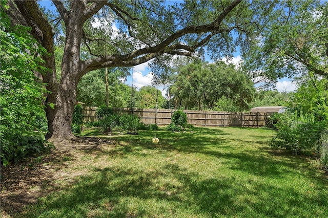 view of yard with fence