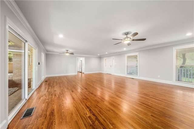 2901 Woodland Dr, Waco, TX 76710 - empty room featuring crown molding, light wood-type flooring, visible vents, and ceiling fan