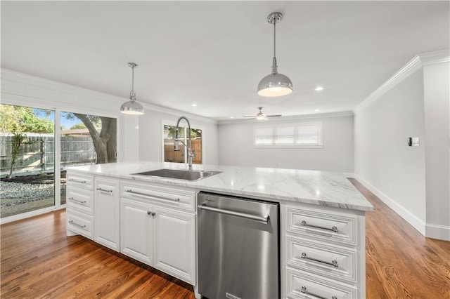 2901 Woodland Dr, Waco, TX 76710 - kitchen with a sink, a healthy amount of sunlight, ornamental molding, light wood-style floors, and stainless steel dishwasher