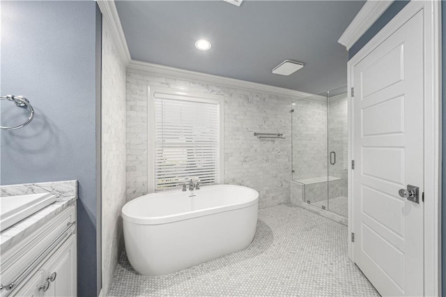 2901 Woodland Dr, Waco, TX 76710 - full bathroom featuring vanity, a freestanding tub, recessed lighting, a stall shower, and crown molding