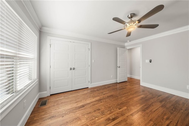 2901 Woodland Dr, Waco, TX 76710 - unfurnished bedroom featuring visible vents, wood finished floors, baseboards, and ornamental molding