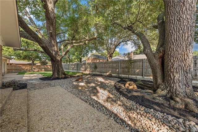 2901 Woodland Dr, Waco, TX 76710 - view of yard featuring a fenced backyard and a patio area