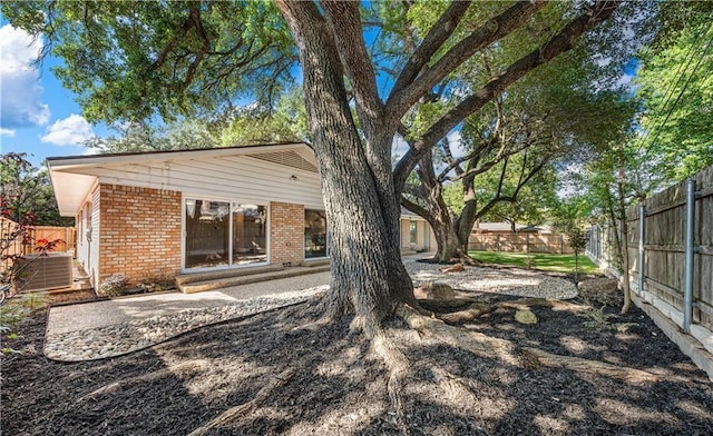 2901 Woodland Dr, Waco, TX 76710 - view of yard with a patio area, central air condition unit, and fence private yard