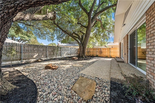 2901 Woodland Dr, Waco, TX 76710 - view of yard featuring a patio and a fenced backyard