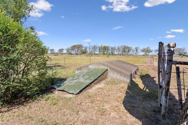 view of yard with a rural view