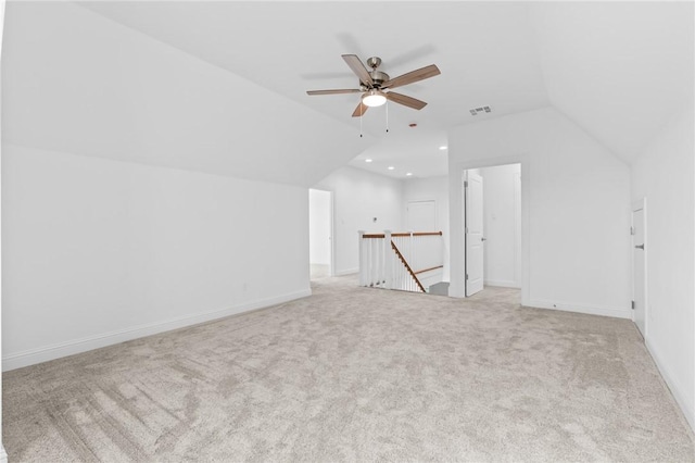 bonus room featuring ceiling fan, baseboards, carpet, and lofted ceiling