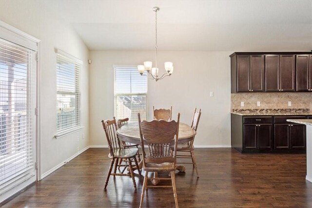 2820 Keathley Dr, Lorena, TX 76655 - dining room featuring a notable chandelier, baseboards, and dark wood-style flooring