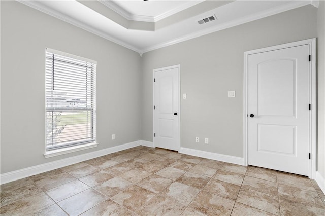 3243 N Lone Star Pkwy, Mcgregor, TX 76657 - unfurnished room with light tile patterned floors, baseboards, visible vents, ornamental molding, and a raised ceiling