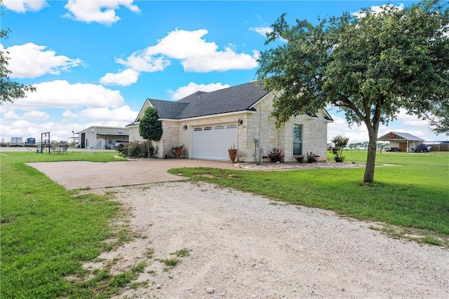 3243 N Lone Star Pkwy, Mcgregor, TX 76657 - view of home's exterior with roof with shingles, a yard, concrete driveway, a garage, and stone siding