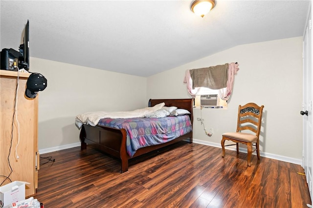 3243 N Lone Star Pkwy, Mcgregor, TX 76657 - bedroom with vaulted ceiling, wood finished floors, and baseboards