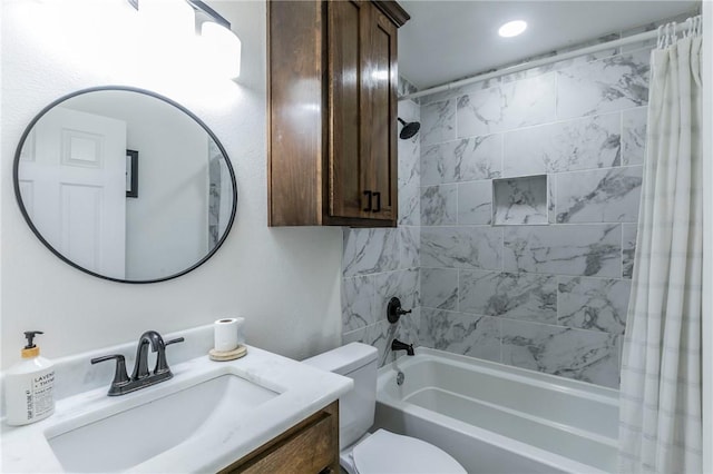 full bath with vanity, toilet, and shower / tub combo with curtain