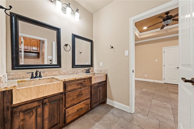 8460 Spicewood Springs Rd, China Spring, TX 76633 - full bath featuring a tray ceiling, a ceiling fan, baseboards, and a sink