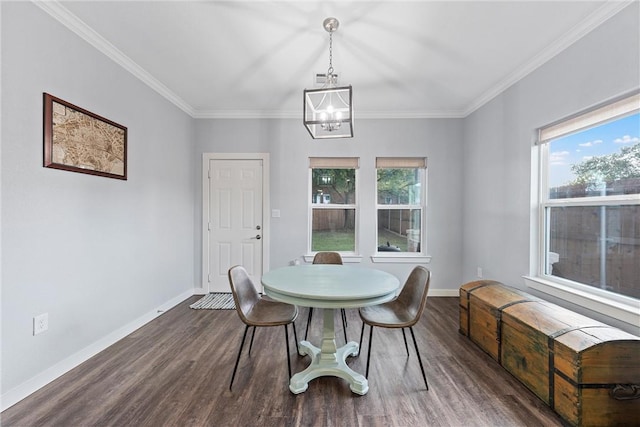 dining room featuring a chandelier, dark wood-style floors, a wealth of natural light, and baseboards