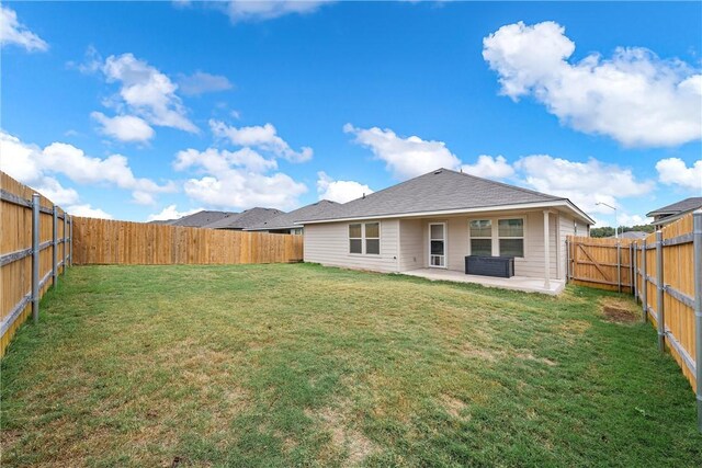 960 Chambray Dr, Troy, TX 76579 - back of house with a lawn, a fenced backyard, and a patio area