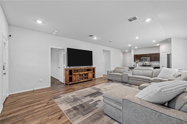 960 Chambray Dr, Troy, TX 76579 - living room featuring recessed lighting, visible vents, baseboards, and wood finished floors