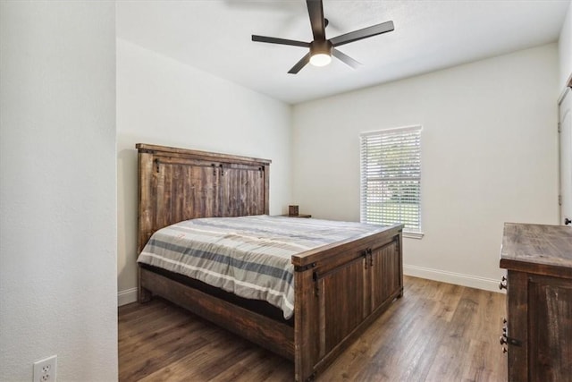 629 S 5th St, Waco, TX 76706 - bedroom featuring a ceiling fan, wood finished floors, and baseboards