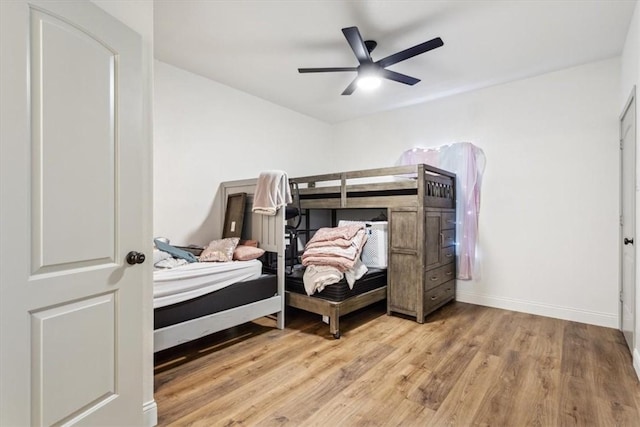 629 S 5th St, Waco, TX 76706 - bedroom with wood finished floors, baseboards, and ceiling fan