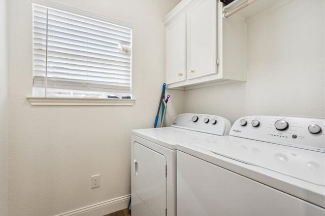 629 S 5th St, Waco, TX 76706 - laundry area featuring baseboards, cabinet space, and washing machine and dryer