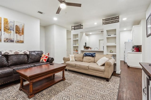 629 S 5th St, Waco, TX 76706 - living area featuring built in features, wood finished floors, visible vents, recessed lighting, and ceiling fan