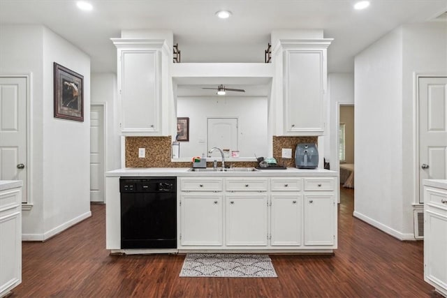 629 S 5th St, Waco, TX 76706 - kitchen with a ceiling fan, a sink, light countertops, black dishwasher, and white cabinetry