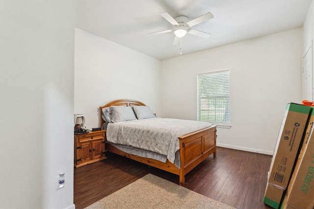 629 S 5th St, Waco, TX 76706 - bedroom with ceiling fan, dark wood-type flooring, and baseboards